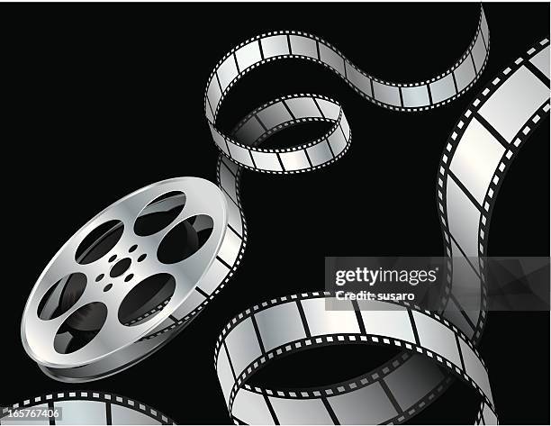 film reel on black - film negative stock illustrations