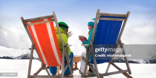 after-ski couple - apres ski stock pictures, royalty-free photos & images