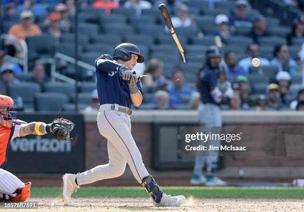 Sam Haggerty of the Seattle Mariners breaks his bat on a foul ball during the ninth inning against the New York Mets at Citi Field on September 03,...