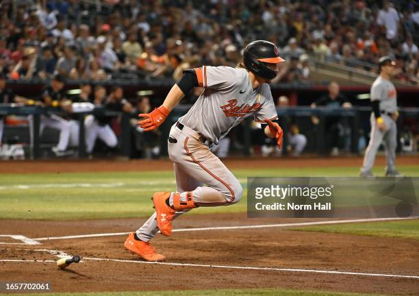 Gunnar Henderson of the Baltimore Orioles hits a two-RBI single against the Arizona Diamondbacks during the second inning at Chase Field on September...