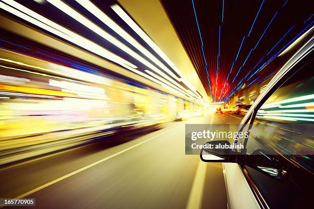 driving in urban scene - super slow motion stock pictures, royalty-free photos & images