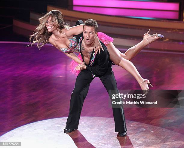 Guelcan Kamps and Nikita Bazev attend the 1st Show of 'Let's Dance' on RTL on April 5, 2013 in Cologne, Germany.