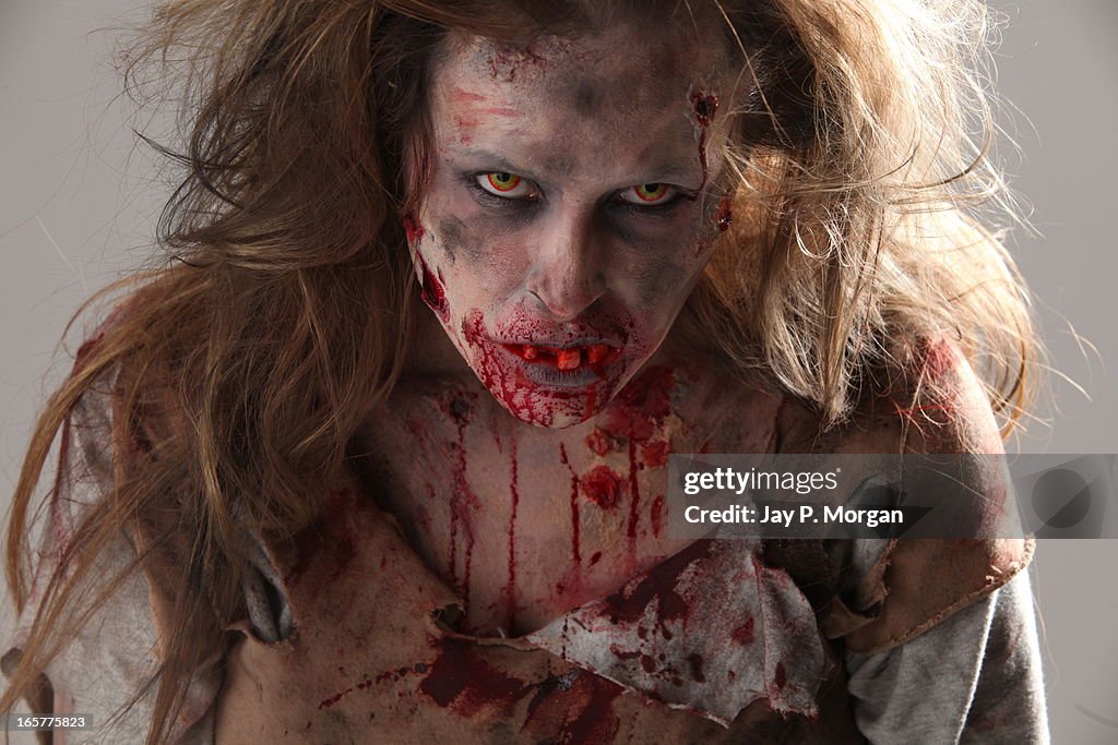 Zombie woman stares ahead