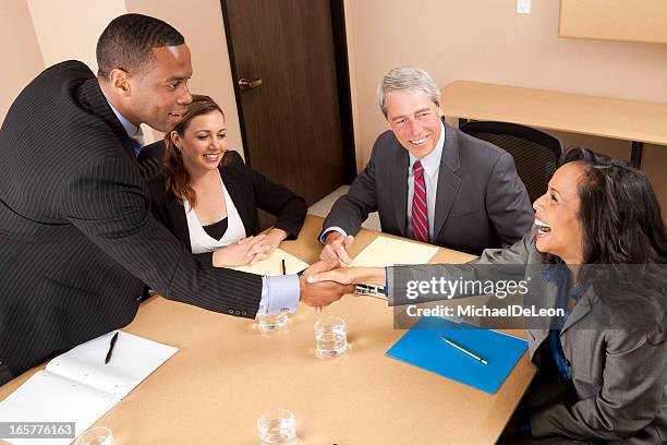 business handshake - michael virtue stock pictures, royalty-free photos & images