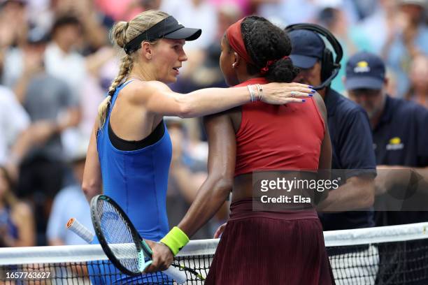 Coco Gauff of the United States embraces Caroline Wozniacki of Denmark after defeating her in their Women's Singles Fourth Round match on Day Seven...