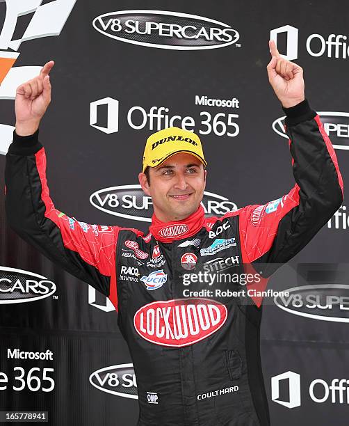 Fabian Coulthard driver of the Lockwood Racing Holden celebrates after winning race three for round two of the V8 Supercar Championship Series at...