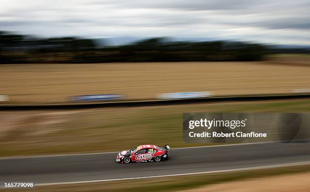 Fabian Coulthard drives the Lockwood Racing Holden during race three for round two of the V8 Supercar Championship Series at Symmons Plains Raceway...