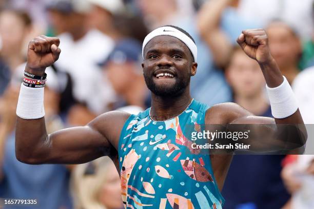 Frances Tiafoe of the United States celebrates match point to defeat Rinky Hijikata of Australia during their Men's Singles Fourth Round match on Day...