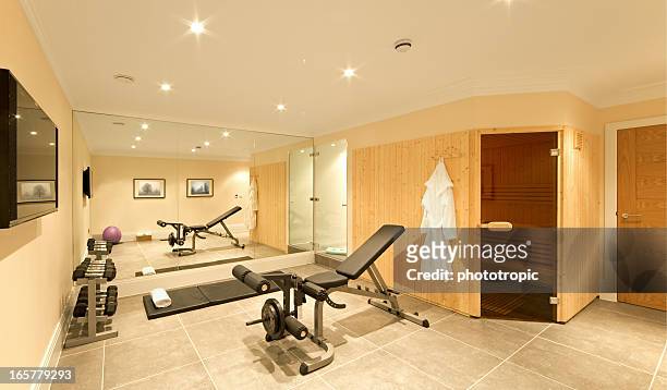 domestic gym - basement stock pictures, royalty-free photos & images