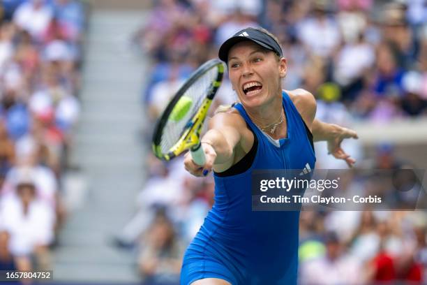 September 3: Caroline Wozniacki of Denmark stretches to make a return against Coco Gauff of the United States in the Women's Singles round four match...