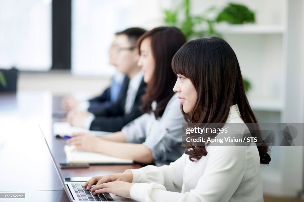 Business people in meeting room