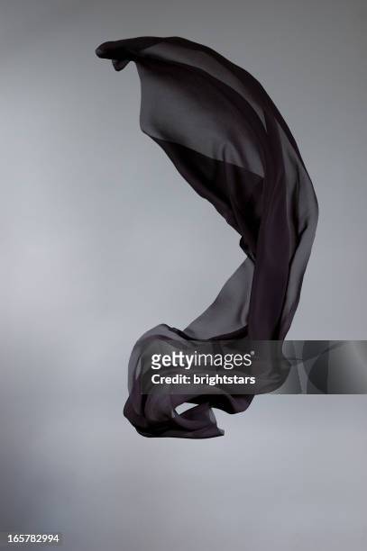 flying black silk - weaving stock pictures, royalty-free photos & images