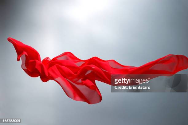 flying red silk - red silk stock pictures, royalty-free photos & images