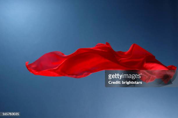 flying red silk - textile stock pictures, royalty-free photos & images