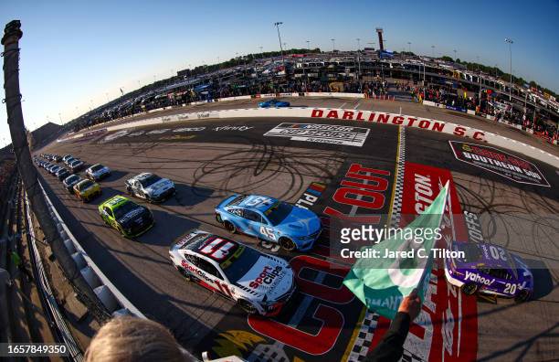 Christopher Bell, driver of the Yahoo! Toyota, leads the field to the green flag to start the NASCAR Cup Series Cook Out Southern 500 at Darlington...
