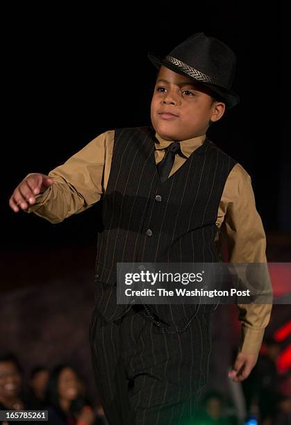 Jon Webster of Burtonsville, Maryland walking on the runway. He joins over a dozen children showcase their talents in the 3rd Annual Glynn Jackson's...