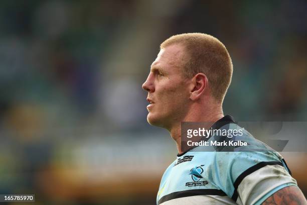 Luke Lewis of the Sharks watches on during the round five NRL match between the Parramatta Eels and the Cronulla Sharks at Parramatta Stadium on...