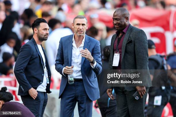 Ex-Arsenal players Martin Keown and Kevin Campbell during the Premier League match between Arsenal FC and Manchester United at Emirates Stadium on...
