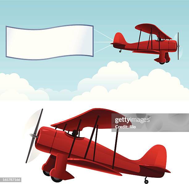 biplane with banner - biplane stock illustrations