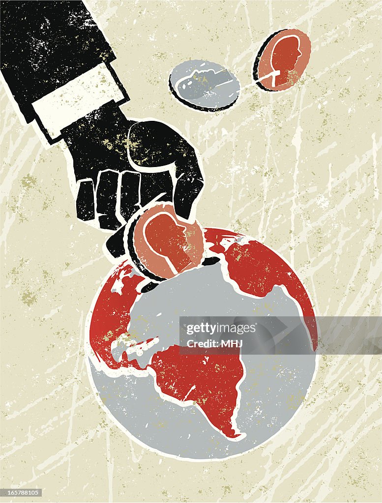 Hand Putting Coins in an Earth Money Box