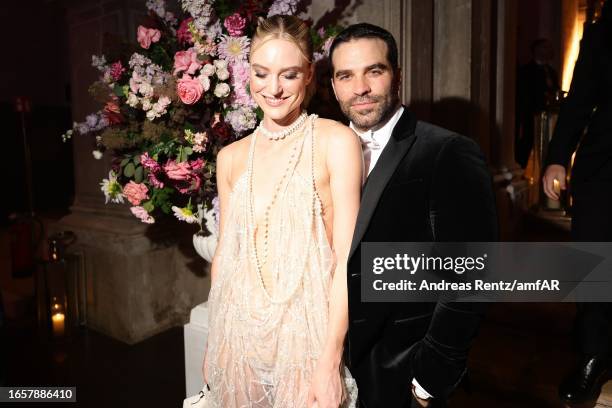 Kim Hnizdo and Alejandro Nones attend the after party for the amfAR gala Venezia 2023 presented by Mastercard and Red Sea International Film Festival...