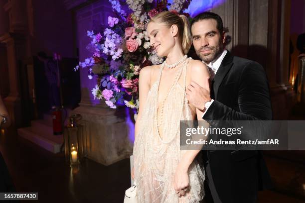 Kim Hnizdo and Alejandro Nones attend the after party for the amfAR gala Venezia 2023 presented by Mastercard and Red Sea International Film Festival...