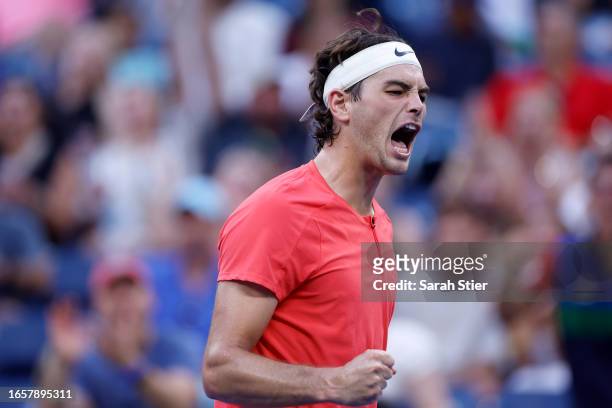 Taylor Fritz of the United States reacts against Dominic Stricker of Switzerland during their Men's Singles Fourth Round match on Day Seven of the...