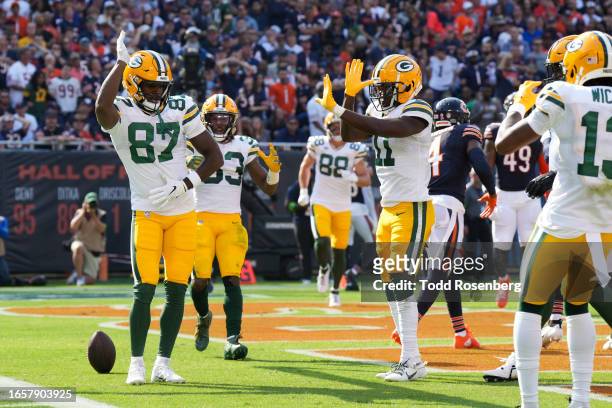 Wide receiver Romeo Doubs, wide receiver Jayden Reed, Running Back Aaron Jones, and wide receiver Dontayvion Wicks of the Green Bay Packers celebrate...