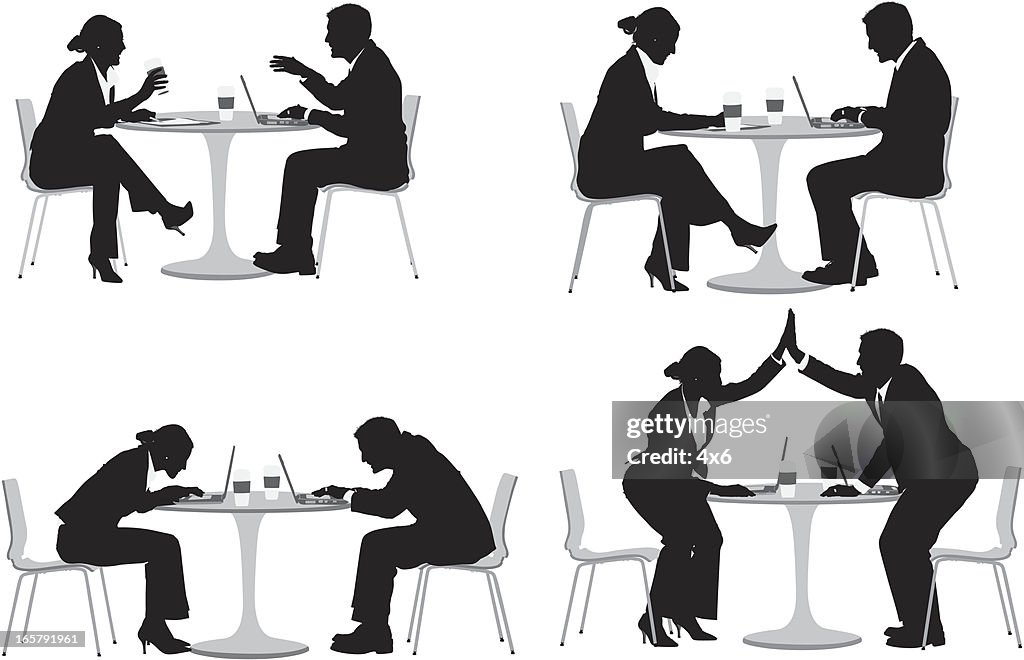 Business couple sitting in a restaurant