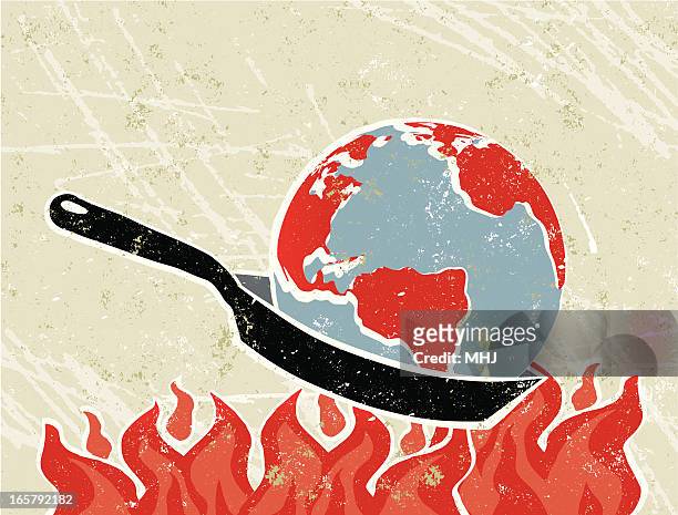 world globe in eine bratpfanne mit flames - global warming stock-grafiken, -clipart, -cartoons und -symbole