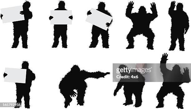 ilustraciones, imágenes clip art, dibujos animados e iconos de stock de hombre en traje de pie en un gorila - gorila
