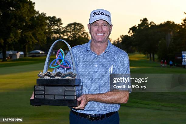 Steve Flesch poses with the Ascension Charity Classic trophy after winning the Ascension Charity Classic at Norwood Hills Country Club on September...