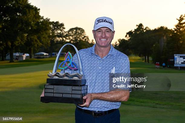 Steve Flesch poses with the Ascension Charity Classic trophy after winning the Ascension Charity Classic at Norwood Hills Country Club on September...