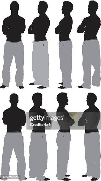 capoeira artist standing with arms crossed - capoeira stock illustrations