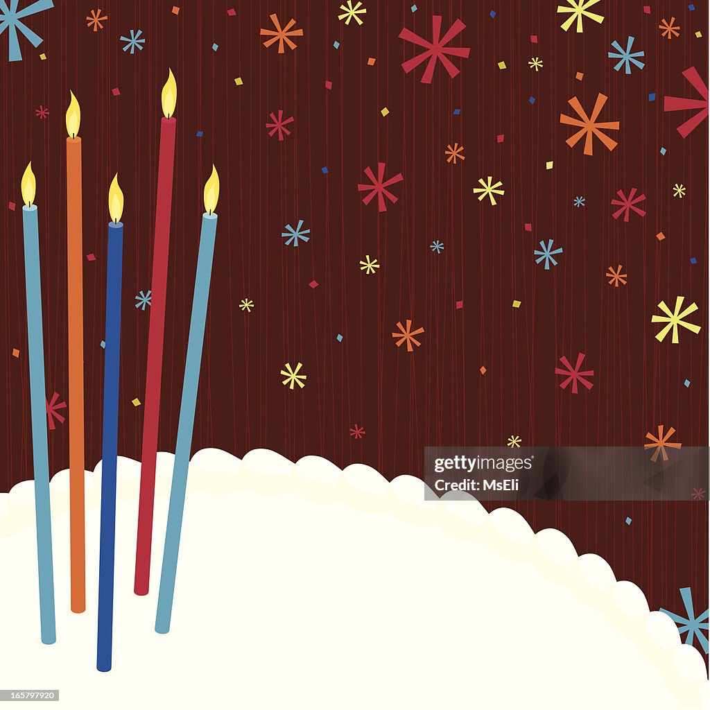 Birthday cake with candles and confetti