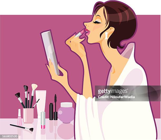 make-up girl - applying mascara stock illustrations