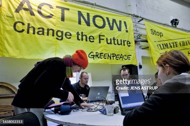 Greenpeace activists prepare actions in a Greenpeace's camp set up on the little island of Refshaleoeen, on December 7, 2009 in Copenhagen. At least...