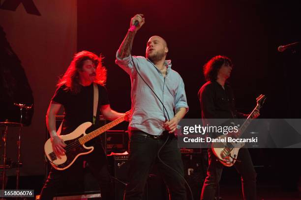 Brad Magers, Matt Caughthran and Ken Horne of The Bronx during their performance on stage as a supporting act for Bad Religion at Congress Theater on...