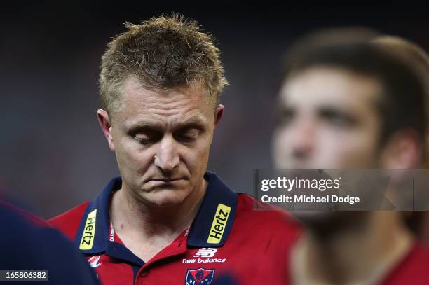 Demons coach Mark Neeld during the warm up before the round two AFL match between the Essendon Bombers and the Melbourne Demons at Melbourne Cricket...