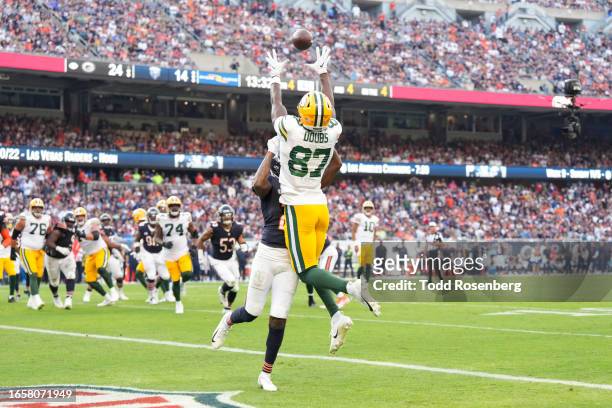 Wide Receiver Romeo Doubs of the Green Bay Packers attempts a catch during an NFL football game against the Chicago Bears at Soldier Field on...