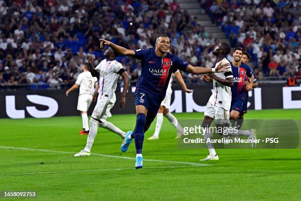 Kylian Mbappe of Paris Saint-Germain reacts after scoring during the Ligue 1 Uber Eats match between Olympique Lyonnais and Paris Saint-Germain at...