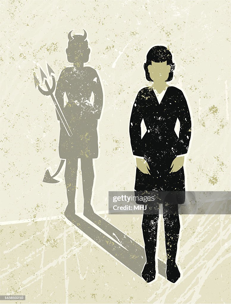 Business Woman Casting a Devil Shaped Shadow