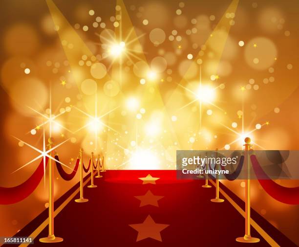 red carpet with bright flashy background - red carpet event stock illustrations