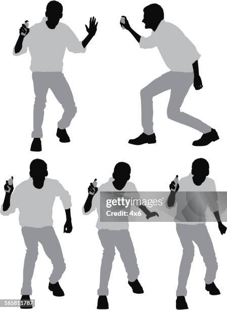 man spraying party string - silly string can stock illustrations