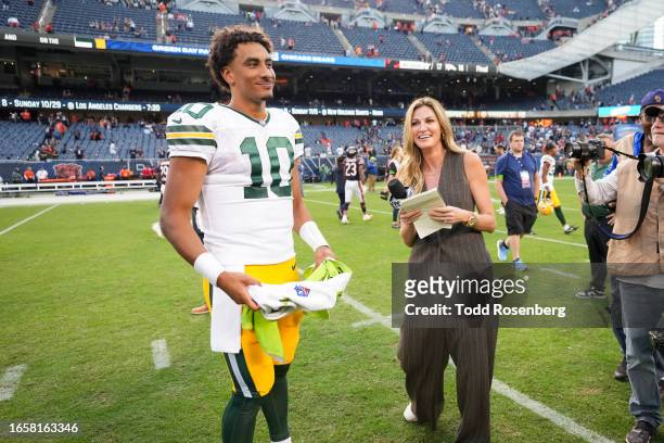 Quarterback Jordan Love of the Green Bay Packers talks to TV Personality Erin Andrews of Fox after an NFL football game against the Chicago Bears at...