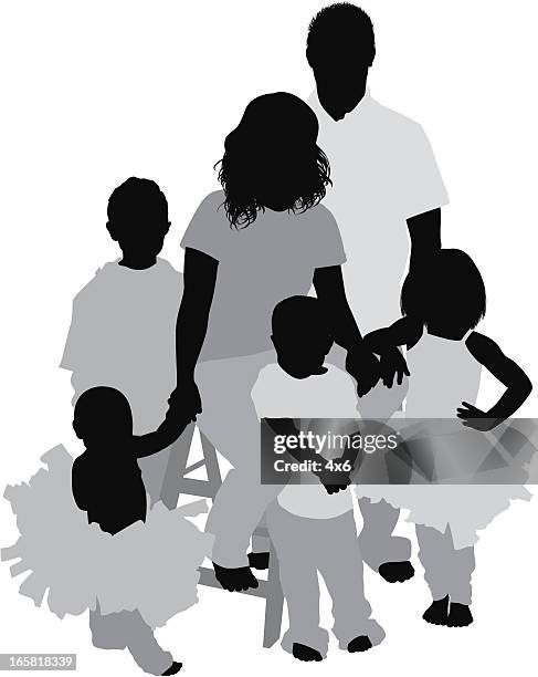 parents with their children - portrait stool stock illustrations