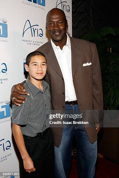 Charlotte Bobcats owner Michael Jordan greets Make-A-Wish Kid Joseph Dominguez at the 12th Annual Michael Jordan Celebrity Invitational Gala At ARIA...