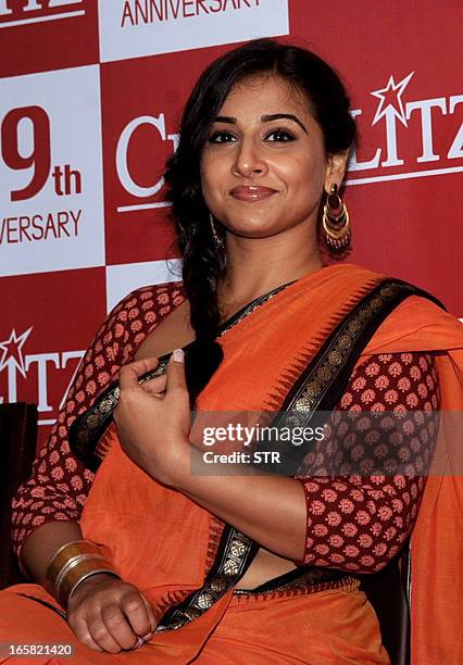 Indian Bollywood film actress Vidya Balan poses during the unveiling of the 39th anniversary issue of Cine Blitz magazine 'Celebrating 100 Years of...