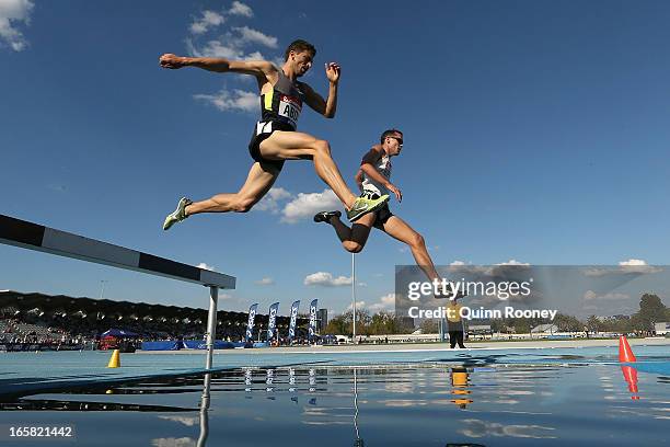 Youcef Abdi and James Nipperess of Australia compete in the Men's 3000 Metres Steeplechase during the 2013 Melbourne Track Classic at Olympic Park on...