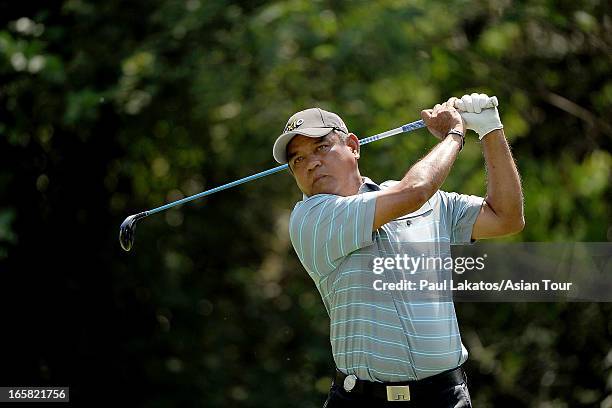 Boonchu Ruangkit of Thailand plays a shot during round three of the Panasonic Open India at Delhi Golf Club on April 6, 2013 in New Delhi, India.